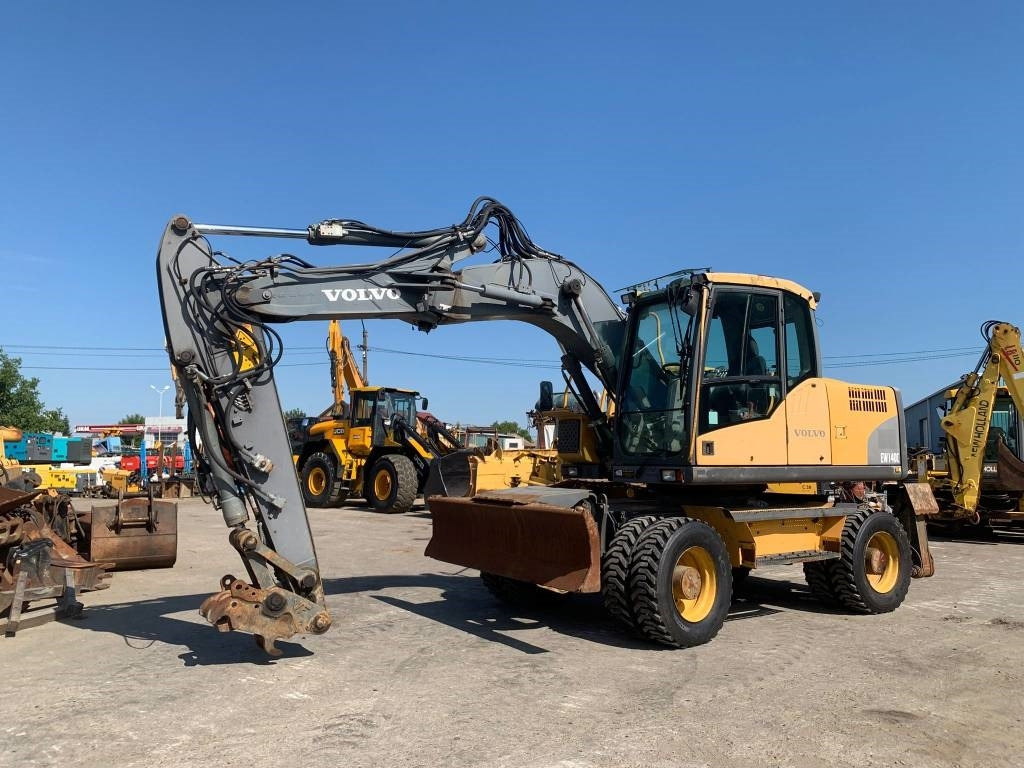 Volvo EW 140 C - Pelle sur pneus: photos 1 Volvo EW 140 C - Pelle sur pneus: photos 1