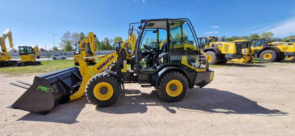 Komatsu WA 70 - Chargeuse sur pneus: photos 1 Komatsu WA 70 - Chargeuse sur pneus: photos 1