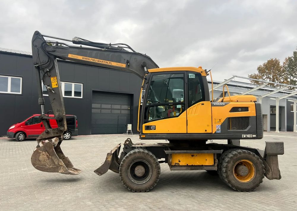 Volvo EW140D - Pelle sur pneus: photos 3 Volvo EW140D - Pelle sur pneus: photos 3