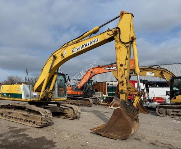 New Holland E 215 - Pelle sur chenille: photos 1 New Holland E 215 - Pelle sur chenille: photos 1