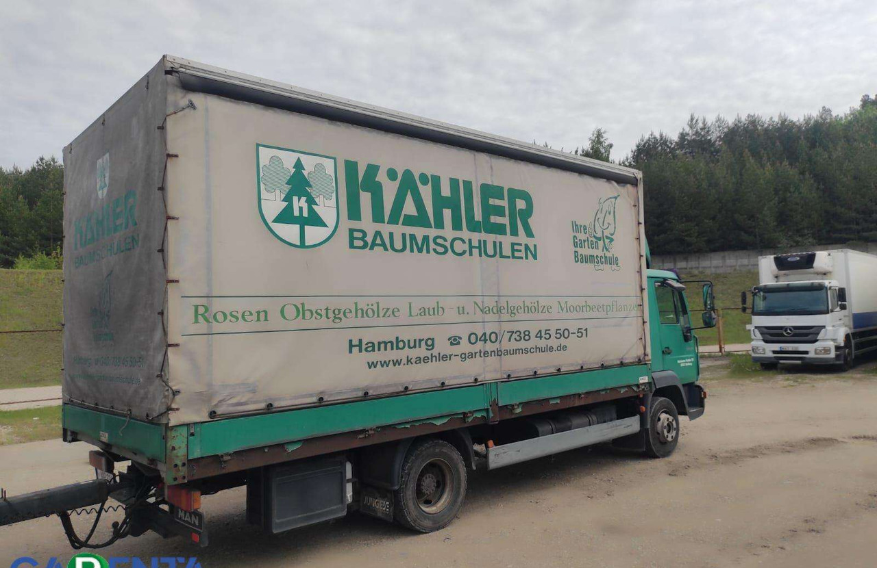 MAN LE8.220 - Camion à rideaux coulissants: photos 3 MAN LE8.220 - Camion à rideaux coulissants: photos 3