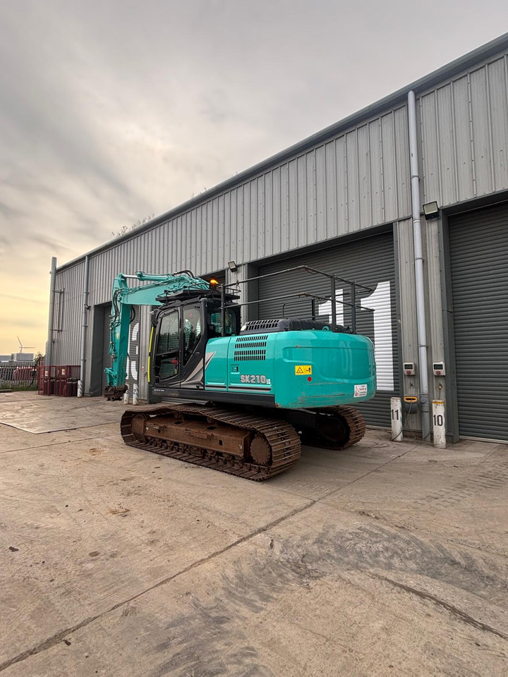Kobelco SK210 LC-11 - Pelle sur chenille: photos 3 Kobelco SK210 LC-11 - Pelle sur chenille: photos 3