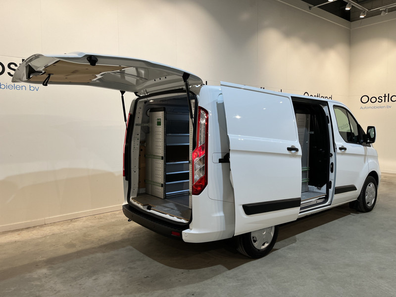 Ford Transit Custom 300 2.0 TDCI L1H1 Trend 130 PK / Servicebus / Bott Inrichting / Euro 6 / Schuifdeur L + R / Airco / CarPlay / Klep / PDC / Navigatie / 3-Zits / BPM VRIJ !! - Fourgonnette: photos 2 Ford Transit Custom 300 2.0 TDCI L1H1 Trend 130 PK / Servicebus / Bott Inrichting / Euro 6 / Schuifdeur L + R / Airco / CarPlay / Klep / PDC / Navigatie / 3-Zits / BPM VRIJ !! - Fourgonnette: photos 2