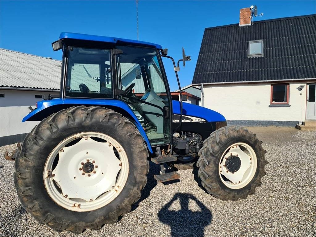 New Holland TL100-4WD - Tracteur agricole: photos 1 New Holland TL100-4WD - Tracteur agricole: photos 1