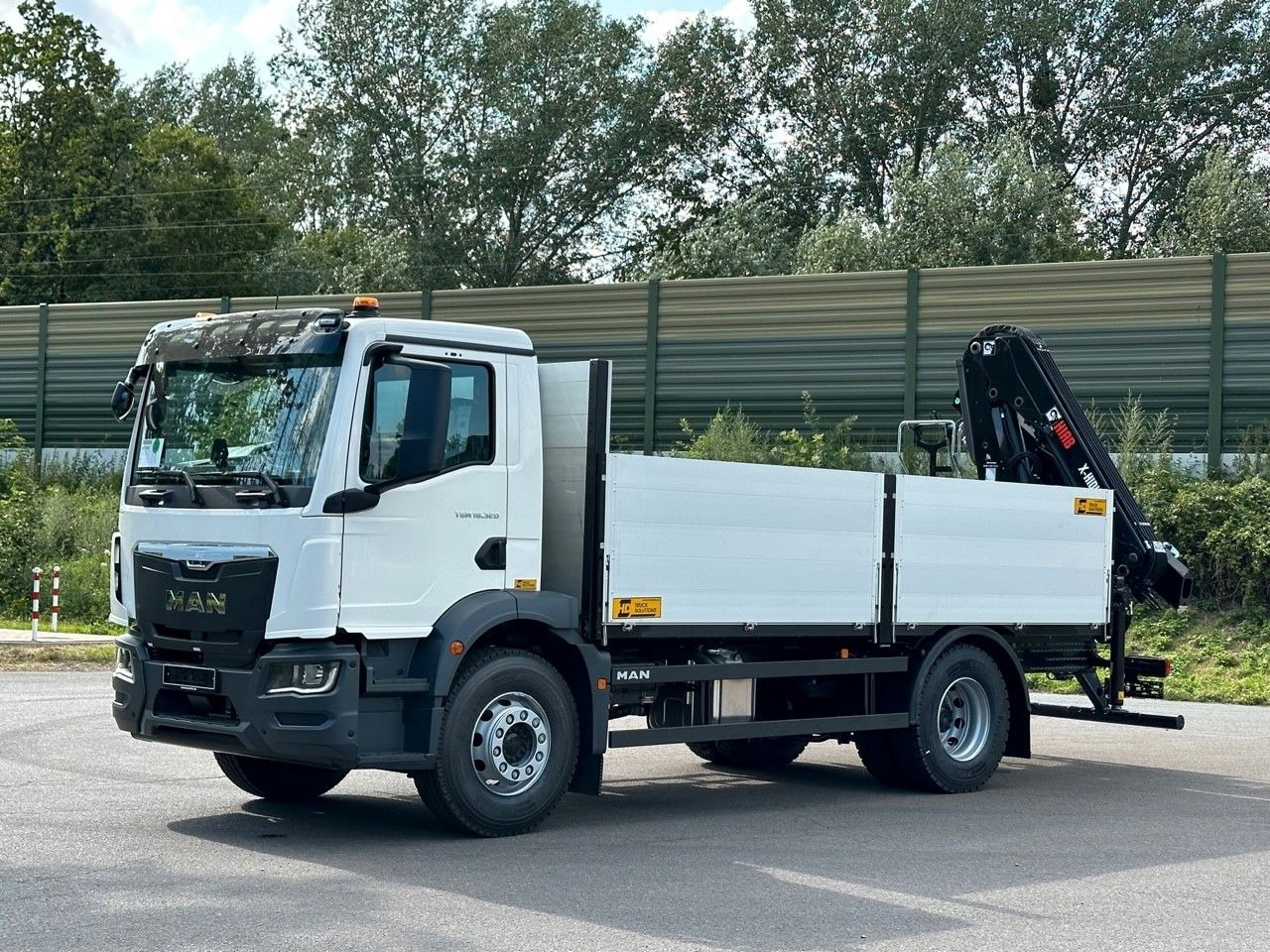 MAN TGM 18.320 4x2 Euro6e Kran Hiab - Camion grue: photos 2 MAN TGM 18.320 4x2 Euro6e Kran Hiab - Camion grue: photos 2