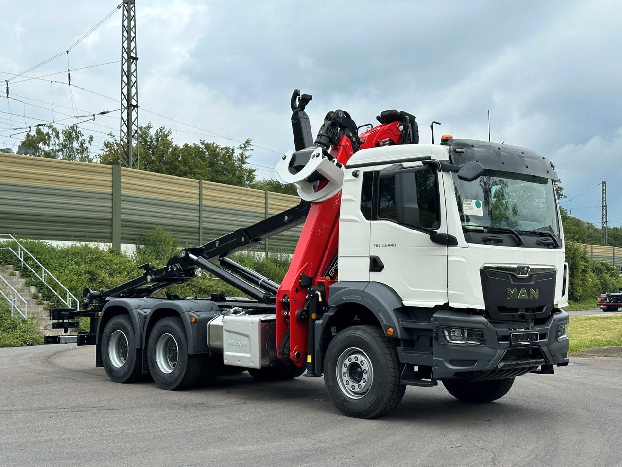 MAN TGS 33.440 6x4 Epsilon 170Z MultiLift 20s56 - Camion ampliroll, Camion grue: photos 1 MAN TGS 33.440 6x4 Epsilon 170Z MultiLift 20s56 - Camion ampliroll, Camion grue: photos 1