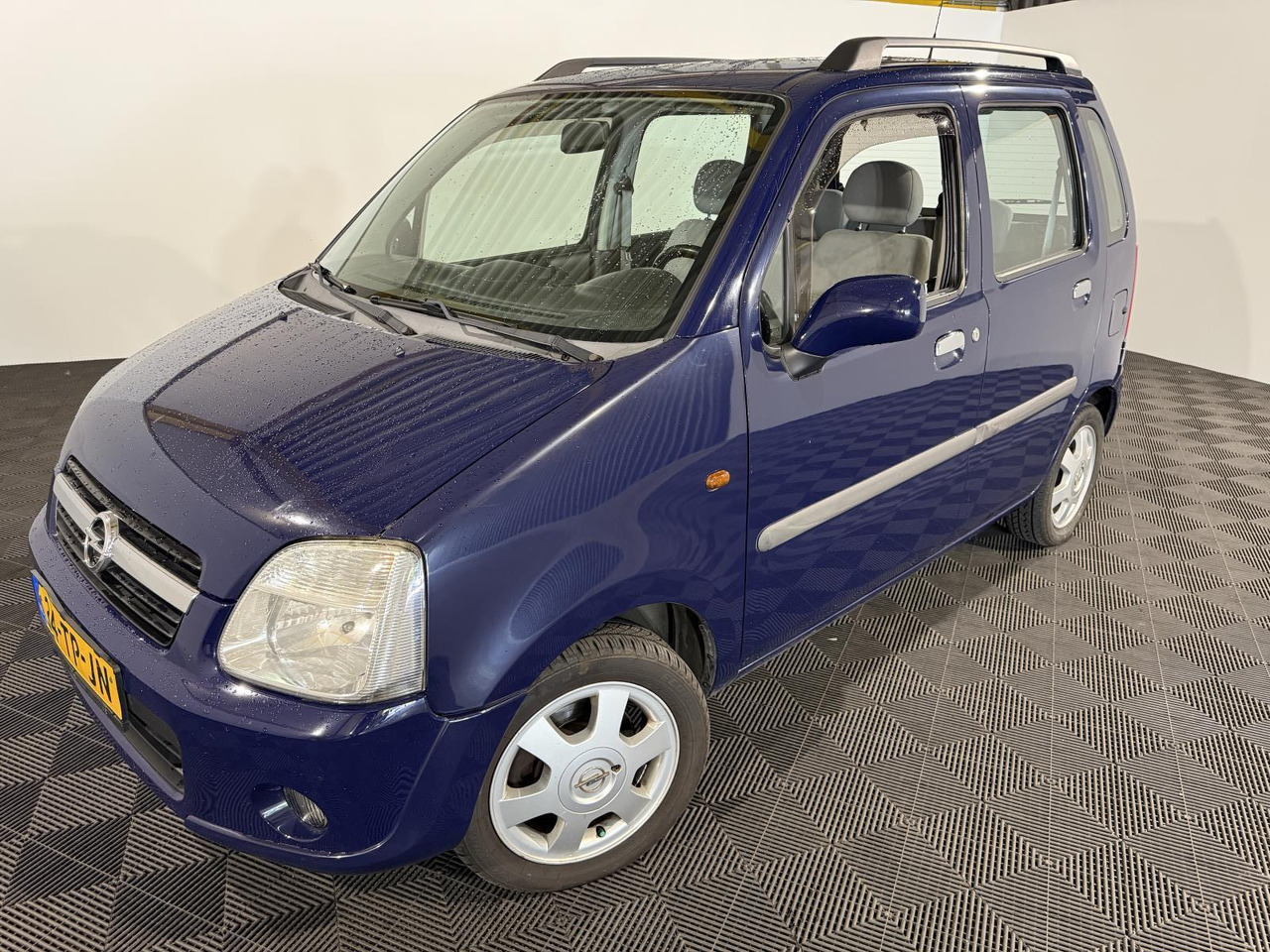 Opel | Agila | 1.2-16V Flexx | 2006 | 214.096 km | 34TPJN | Logisch - Voiture à hayon: photos 1 Opel | Agila | 1.2-16V Flexx | 2006 | 214.096 km | 34TPJN | Logisch - Voiture à hayon: photos 1