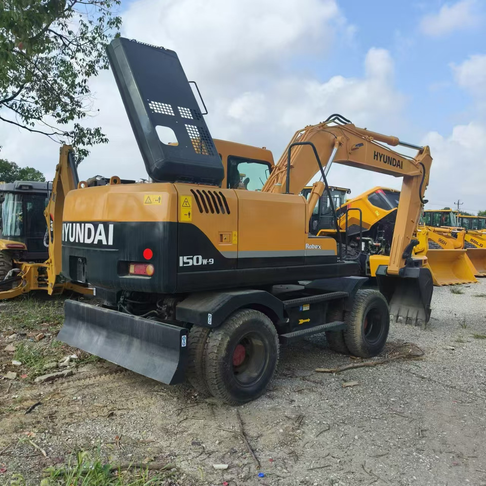 Pelle sur pneus Hyundai R150W-7: photos 6