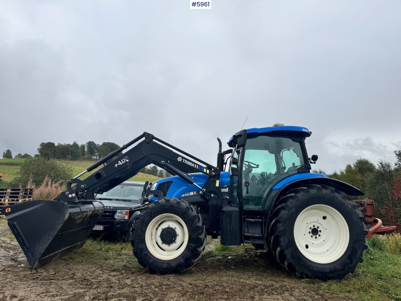 2004 New Holland TS115A with front loader - Tracteur agricole: photos 1 2004 New Holland TS115A with front loader - Tracteur agricole: photos 1