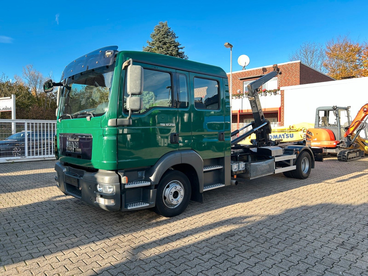MAN 12.250 Doppelkabine Abroller - Camion ampliroll: photos 4 MAN 12.250 Doppelkabine Abroller - Camion ampliroll: photos 4