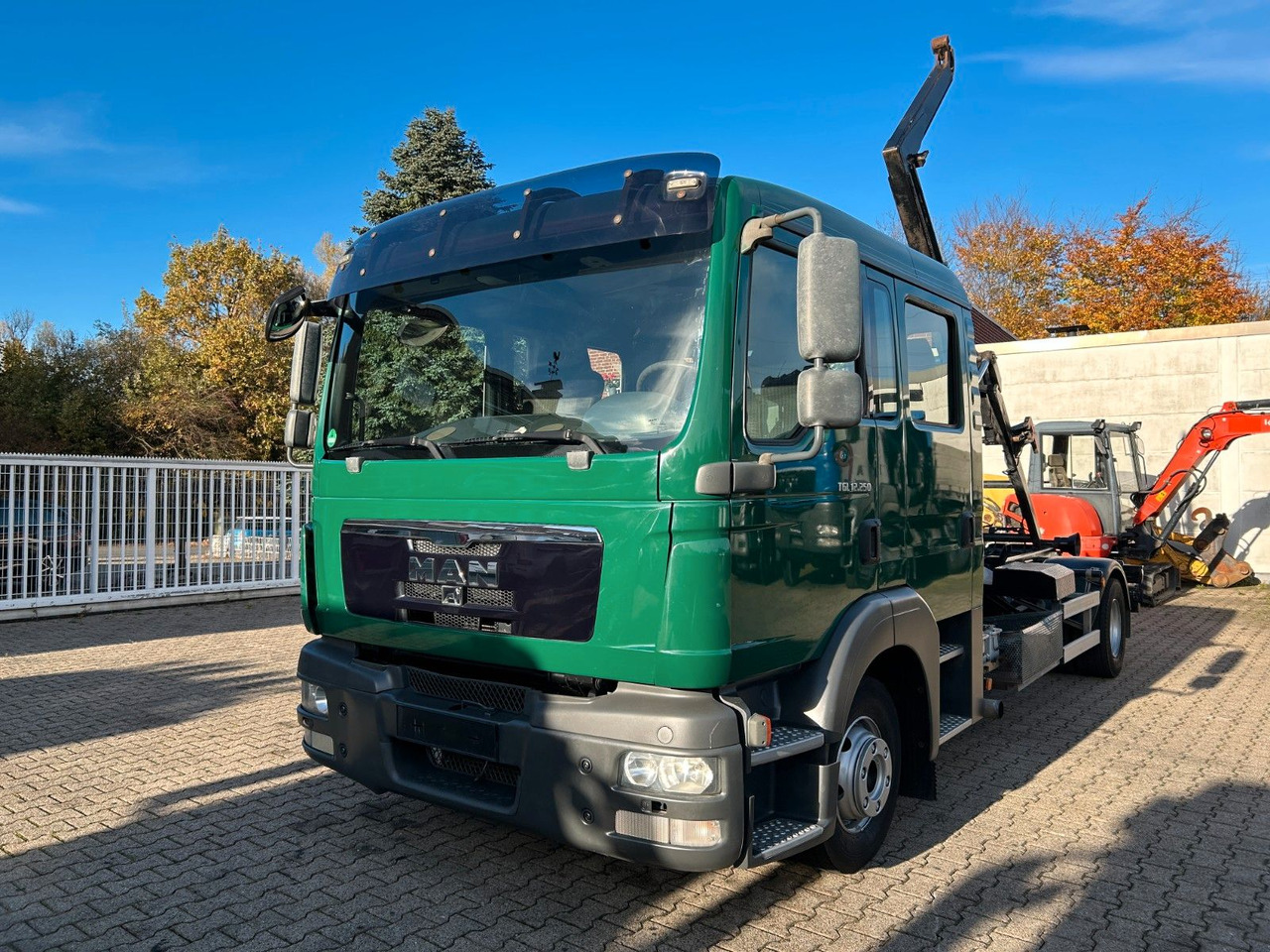 MAN 12.250 Doppelkabine Abroller - Camion ampliroll: photos 1 MAN 12.250 Doppelkabine Abroller - Camion ampliroll: photos 1