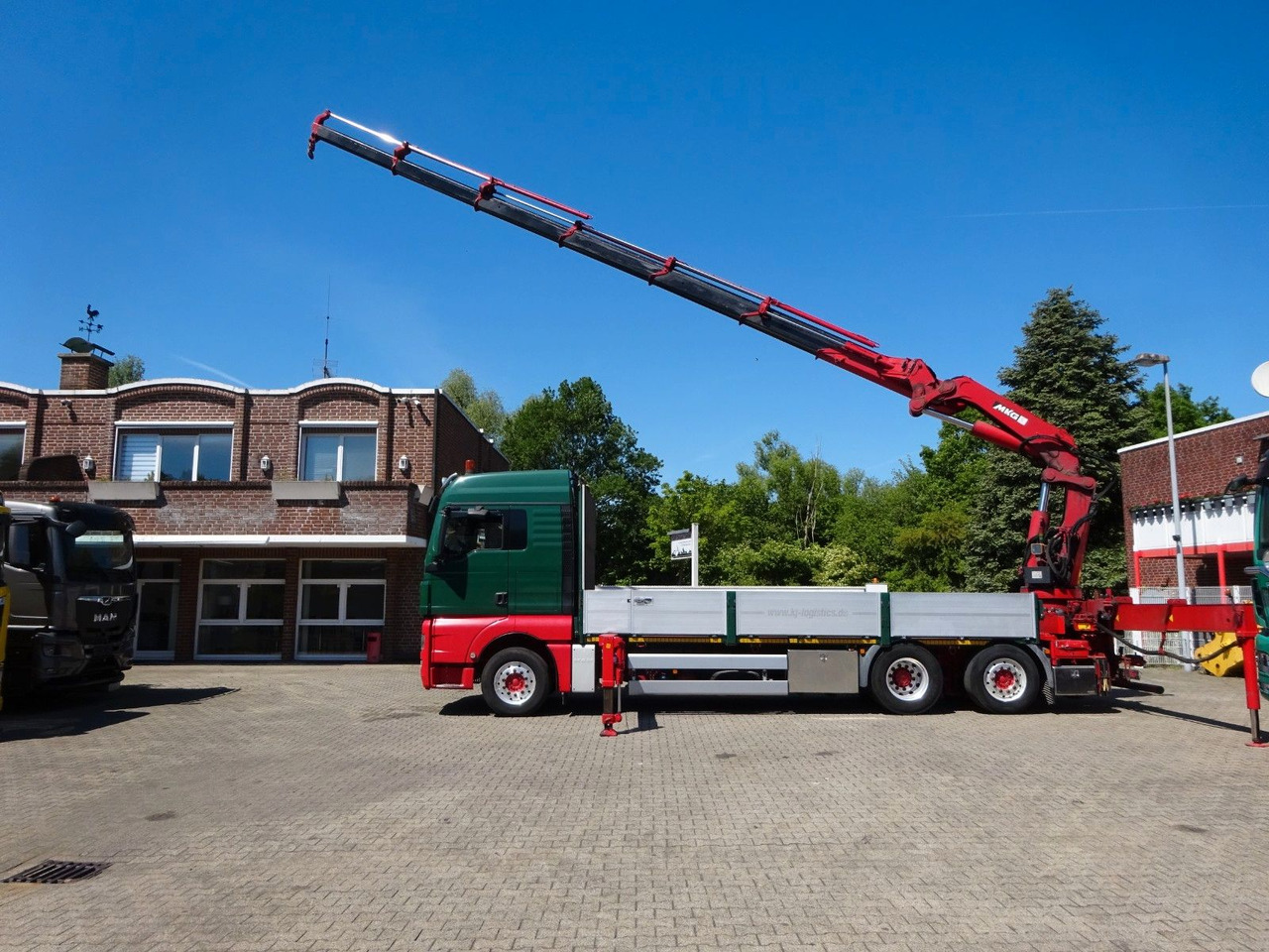 MAN 26.480 TGX + MKG HLK531 Kran +Lift-Lenkachse - Camion grue: photos 1 MAN 26.480 TGX + MKG HLK531 Kran +Lift-Lenkachse - Camion grue: photos 1
