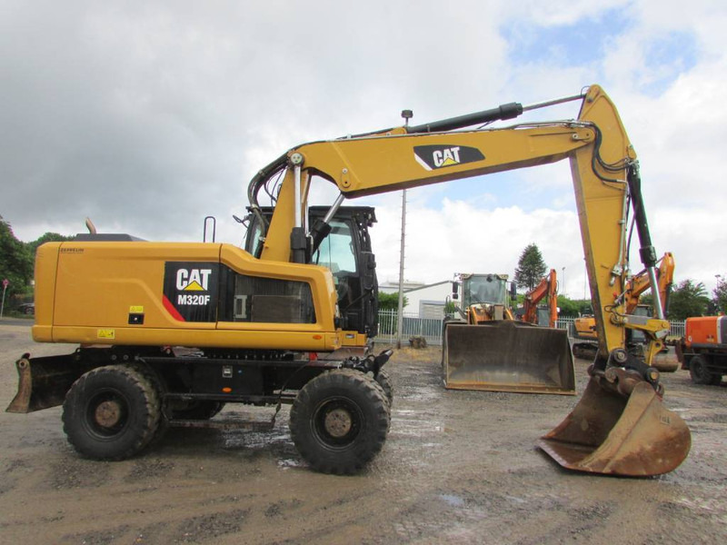 Cat M 320 F Mobilbagger 69.500 EUR / AC - Pelle sur pneus: photos 4 Cat M 320 F Mobilbagger 69.500 EUR / AC - Pelle sur pneus: photos 4
