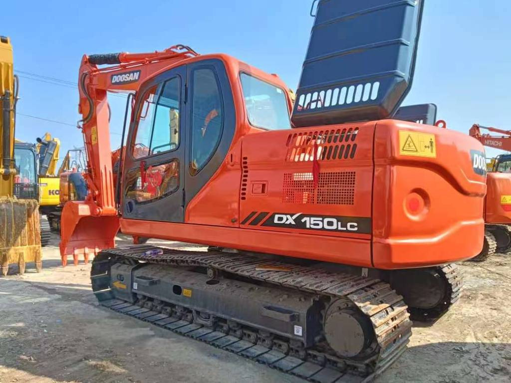Doosan DX150 - Pelle sur chenille: photos 1 Doosan DX150 - Pelle sur chenille: photos 1