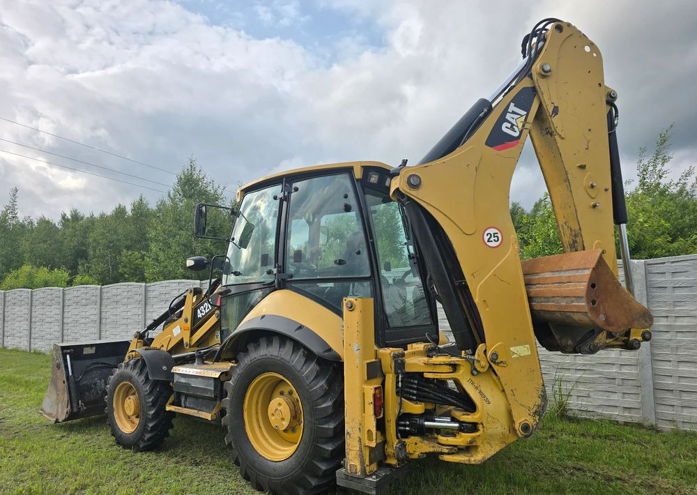 Caterpillar - Tractopelle: photos 5 Caterpillar - Tractopelle: photos 5