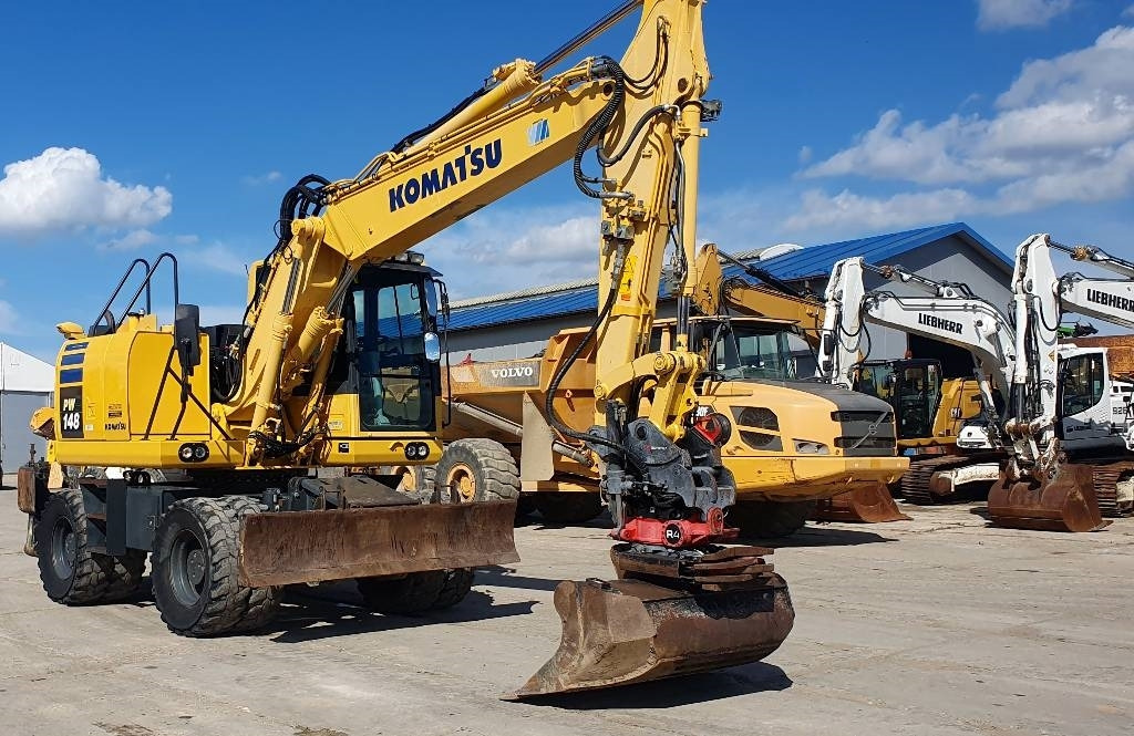 Komatsu PW148-10 - Pelle sur pneus: photos 4 Komatsu PW148-10 - Pelle sur pneus: photos 4