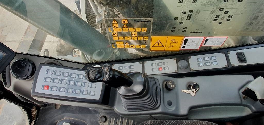 Pelle sur pneus Liebherr A 914 Compact: photos 9