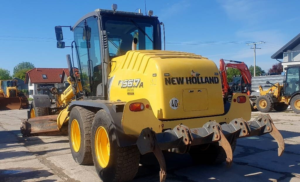 New Holland F 156.7 A - Niveleuse: photos 2 New Holland F 156.7 A - Niveleuse: photos 2