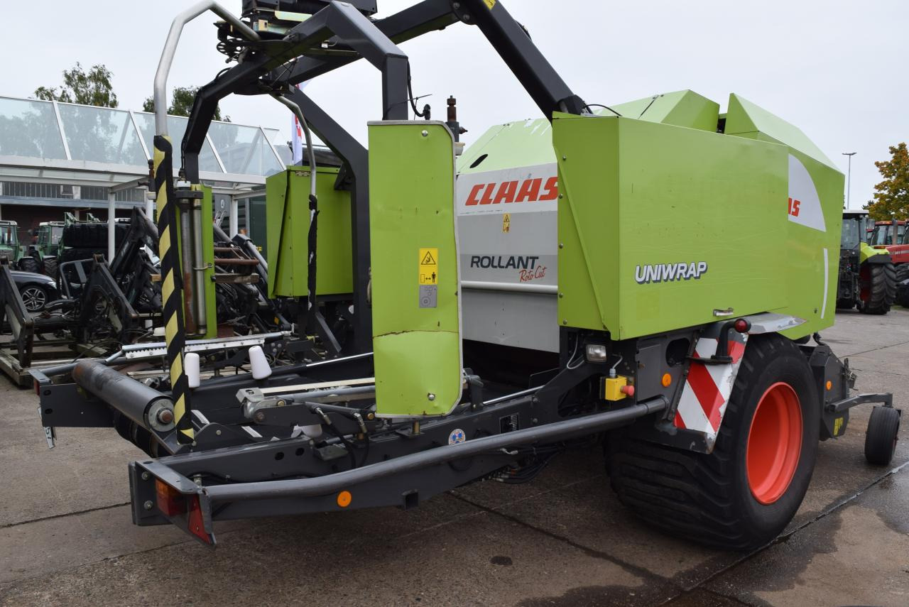 CLAAS Rollant 355 RC Uniwrap - Presse à balles rondes: photos 1 CLAAS Rollant 355 RC Uniwrap - Presse à balles rondes: photos 1