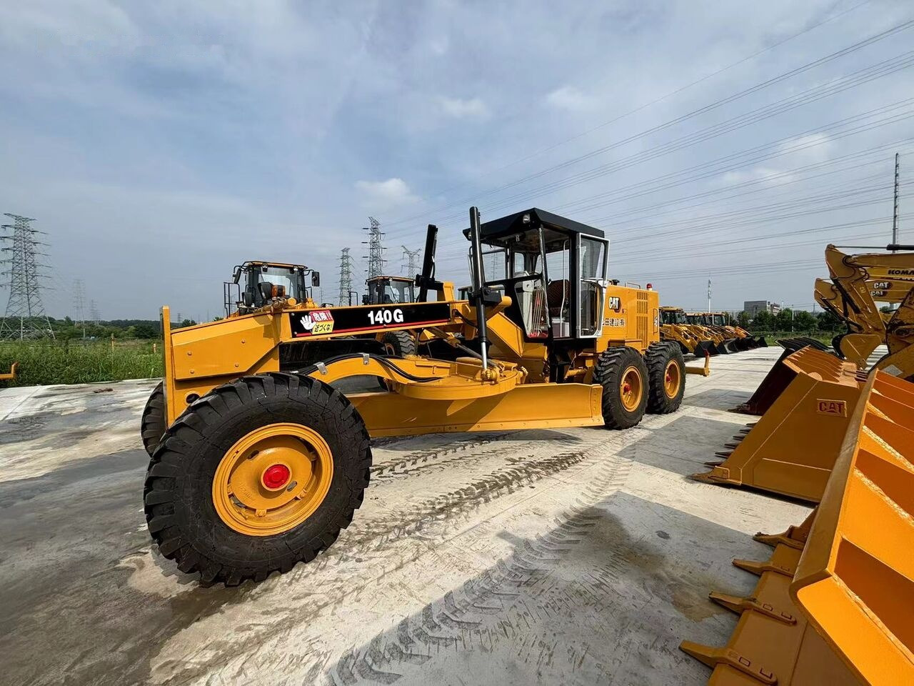 Caterpillar 140G - Niveleuse: photos 1 Caterpillar 140G - Niveleuse: photos 1