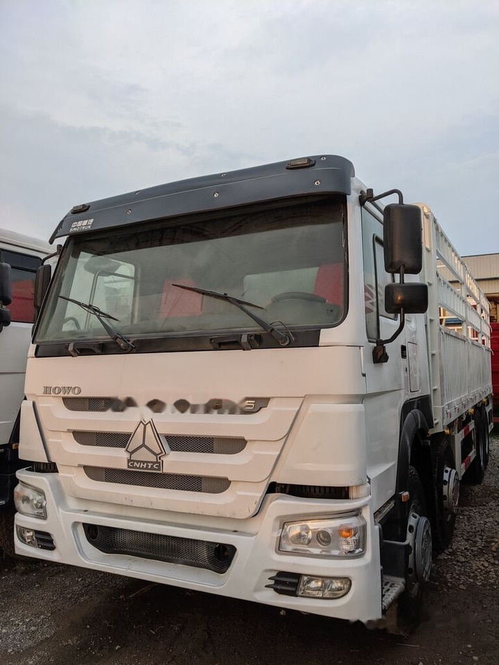 Howo 375 - Camion plateau: photos 1 Howo 375 - Camion plateau: photos 1