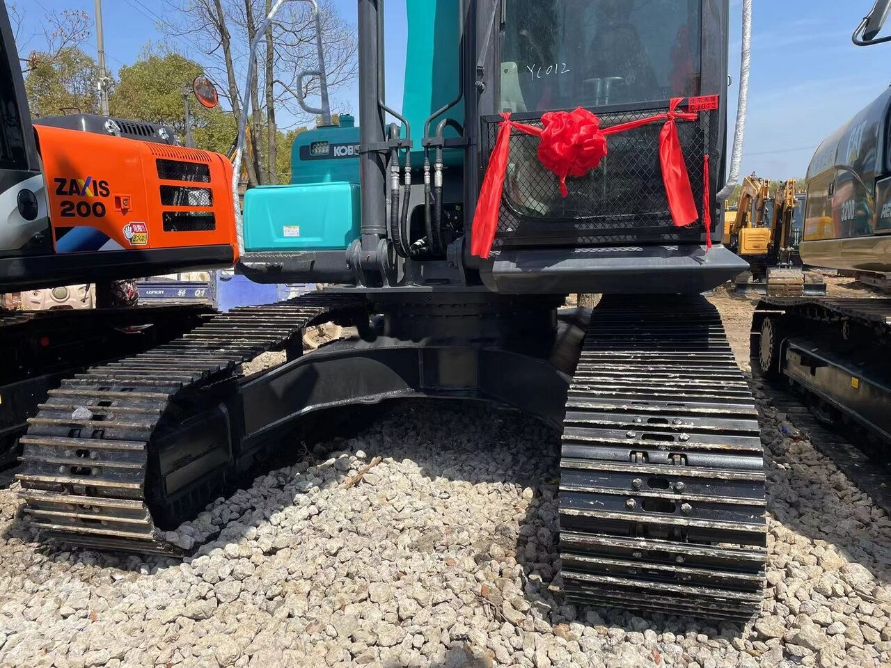 Pelle sur chenille Kobelco SK200: photos 1