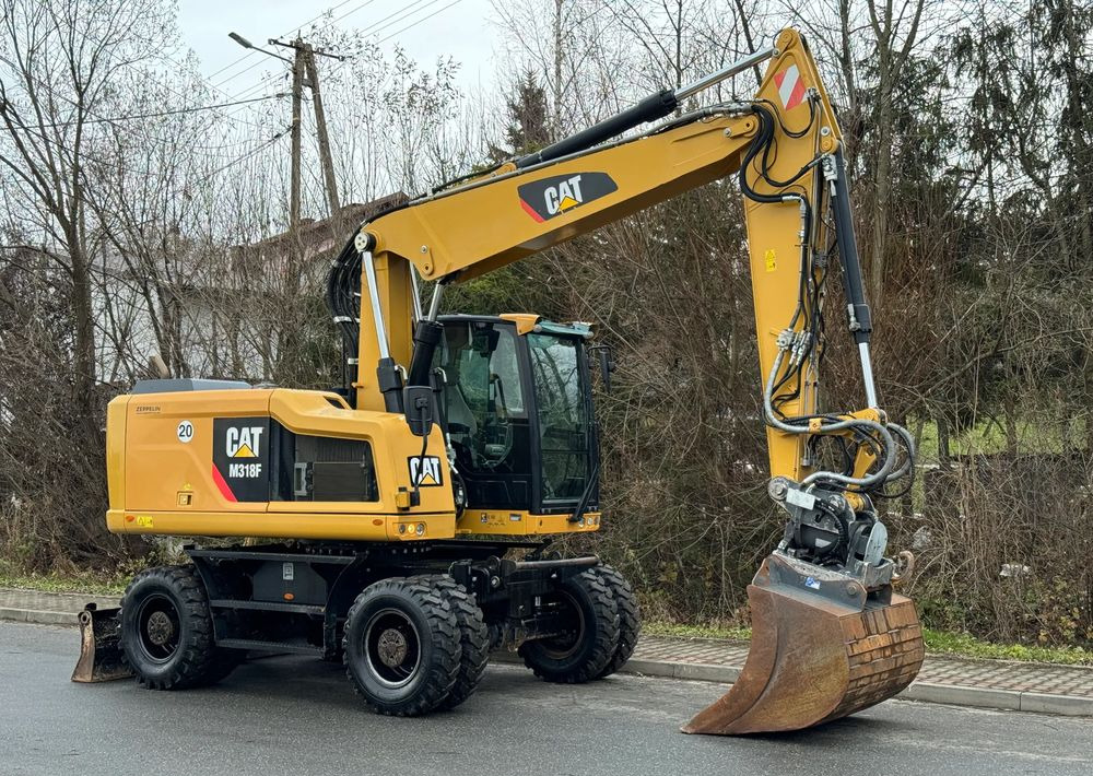 Caterpillar CAT 318 F * Powertilt * Sprowadzony* 9700 MTG * Caterpillar * Stan Perfekcyjny - Pelle sur pneus: photos 3 Caterpillar CAT 318 F * Powertilt * Sprowadzony* 9700 MTG * Caterpillar * Stan Perfekcyjny - Pelle sur pneus: photos 3
