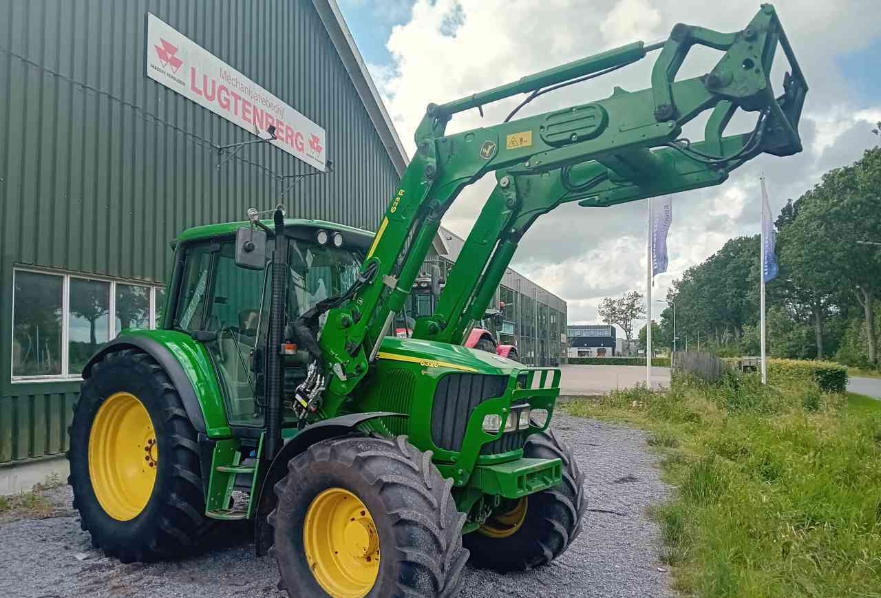 John Deere 6320 met 623R voorlader - Tracteur agricole: photos 1 John Deere 6320 met 623R voorlader - Tracteur agricole: photos 1