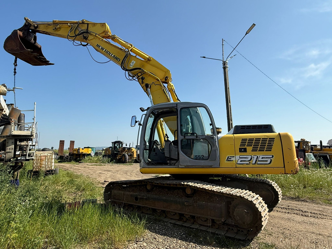 NEW HOLLAND E 215 EXCAVATOR - Pelle sur chenille: photos 2 NEW HOLLAND E 215 EXCAVATOR - Pelle sur chenille: photos 2