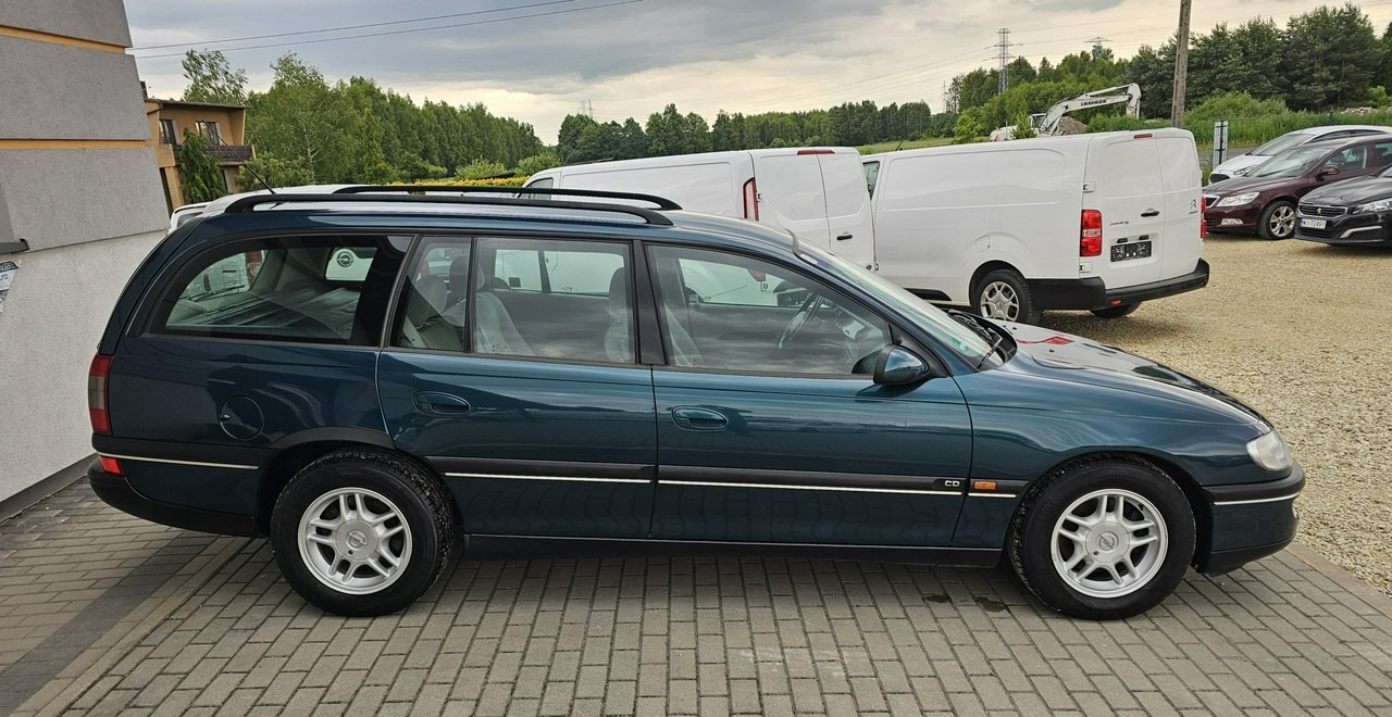 Opel Omega B 2,5 v6 *automat* napęd tył *welury* - Voiture break: photos 5 Opel Omega B 2,5 v6 *automat* napęd tył *welury* - Voiture break: photos 5