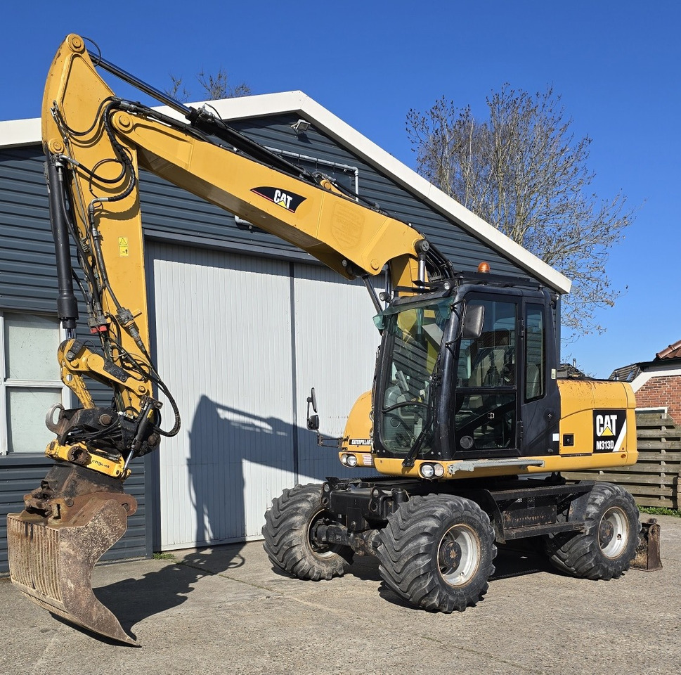 CATERPILLAR M313D - Pelle sur pneus: photos 2 CATERPILLAR M313D - Pelle sur pneus: photos 2