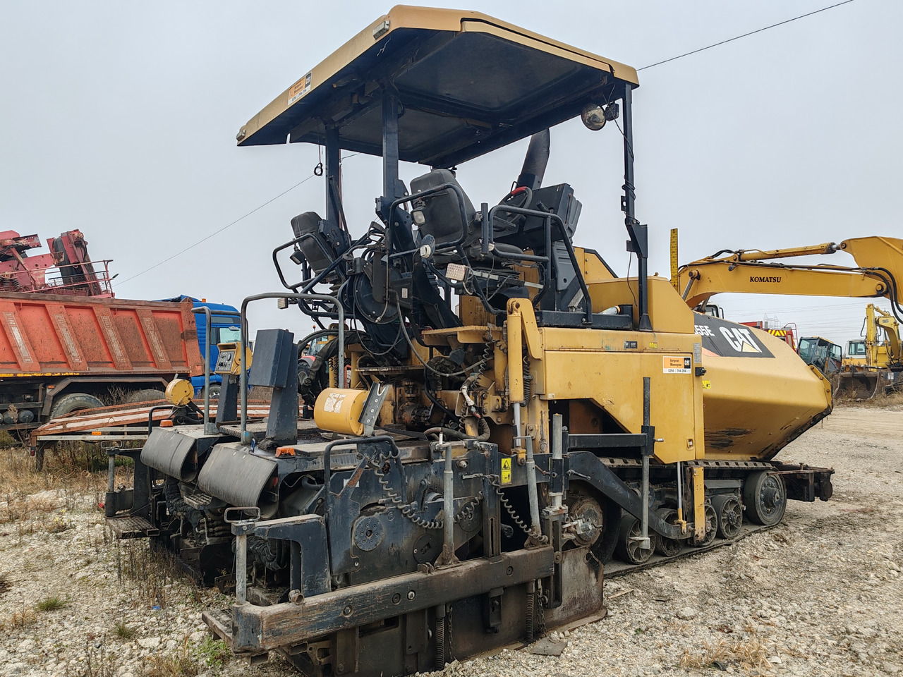 Caterpillar AP555E - Répandeuse: photos 1 Caterpillar AP555E - Répandeuse: photos 1