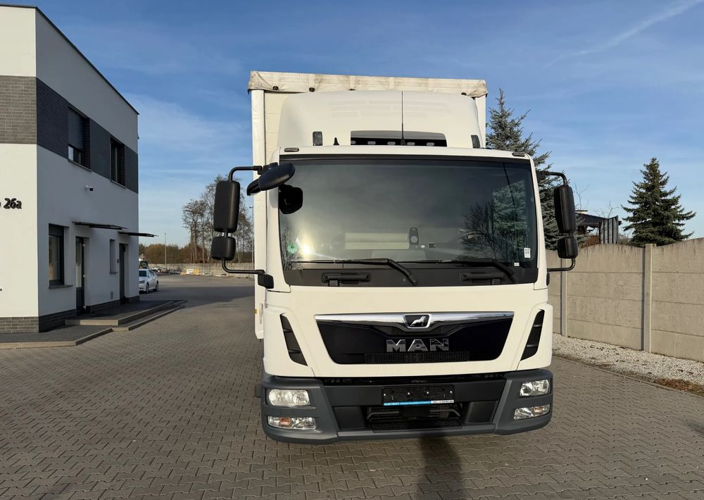 MAN TGL 12.250 - Camion à rideaux coulissants: photos 3 MAN TGL 12.250 - Camion à rideaux coulissants: photos 3