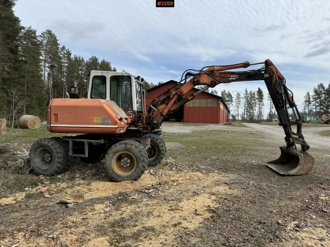 Wheeled excavator Atlas 1004 with attachments - Pelle sur pneus: photos 2 Wheeled excavator Atlas 1004 with attachments - Pelle sur pneus: photos 2