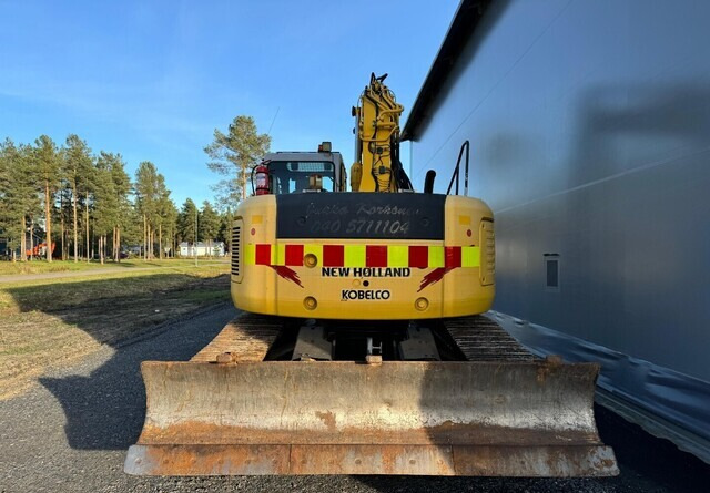 New Holland E235SR - Pelle sur chenille: photos 4 New Holland E235SR - Pelle sur chenille: photos 4