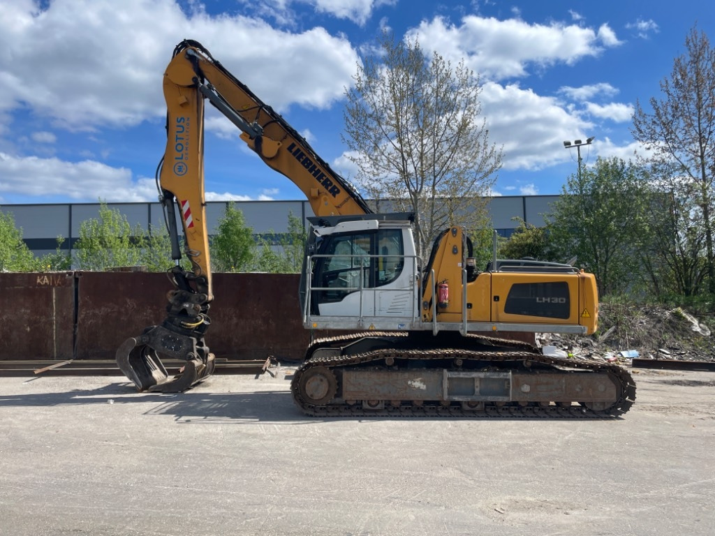 Liebherr LH 30 C Litronic  - Pelle de manutention: photos 1 Liebherr LH 30 C Litronic  - Pelle de manutention: photos 1