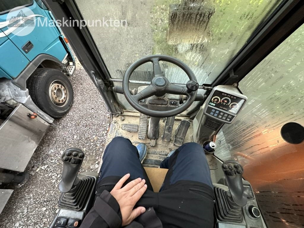 Pelle sur pneus Doosan DX 140 W med vagn och redskap: photos 16 Pelle sur pneus Doosan DX 140 W med vagn och redskap: photos 16