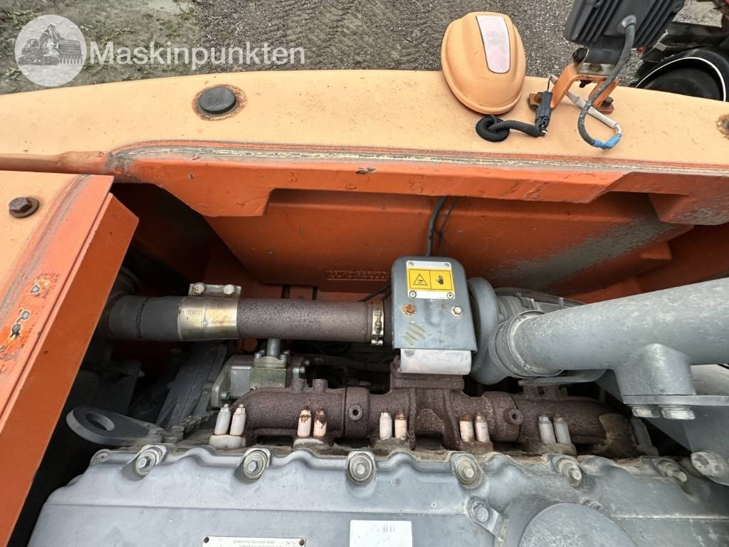 Pelle sur pneus Doosan DX 140 W med vagn och redskap: photos 48 Pelle sur pneus Doosan DX 140 W med vagn och redskap: photos 48