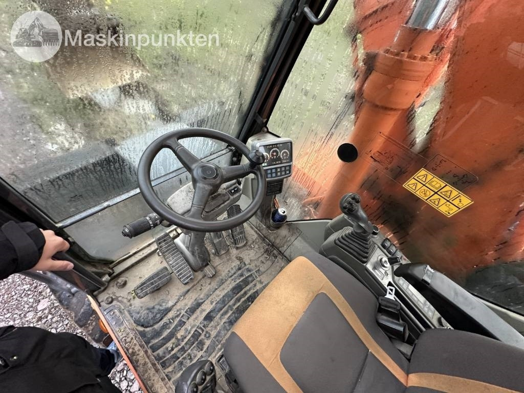 Pelle sur pneus Doosan DX 140 W med vagn och redskap: photos 13 Pelle sur pneus Doosan DX 140 W med vagn och redskap: photos 13