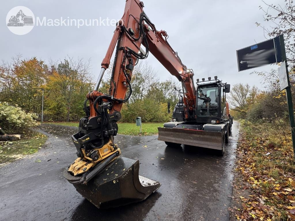 Pelle sur pneus Hitachi ZX 140 W-6 Tippvagn med redskap: photos 1