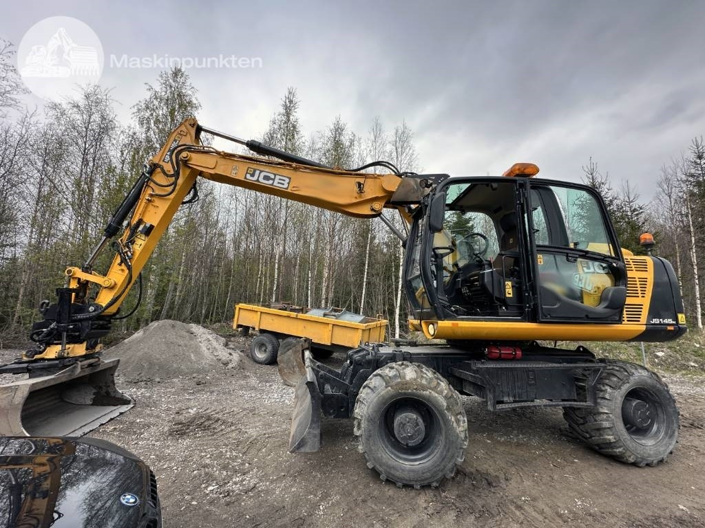 JCB JS 145 W - Pelle sur pneus: photos 1 JCB JS 145 W - Pelle sur pneus: photos 1