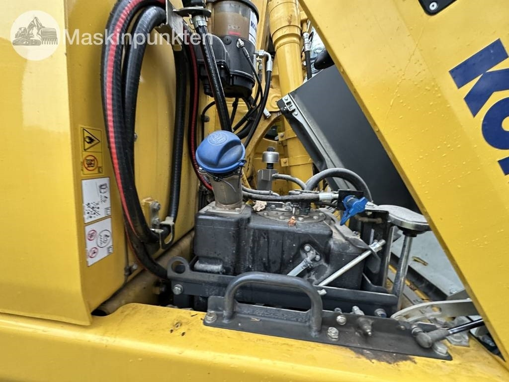Pelle sur pneus Komatsu PW 148-11 med vagn och redskap: photos 48 Pelle sur pneus Komatsu PW 148-11 med vagn och redskap: photos 48