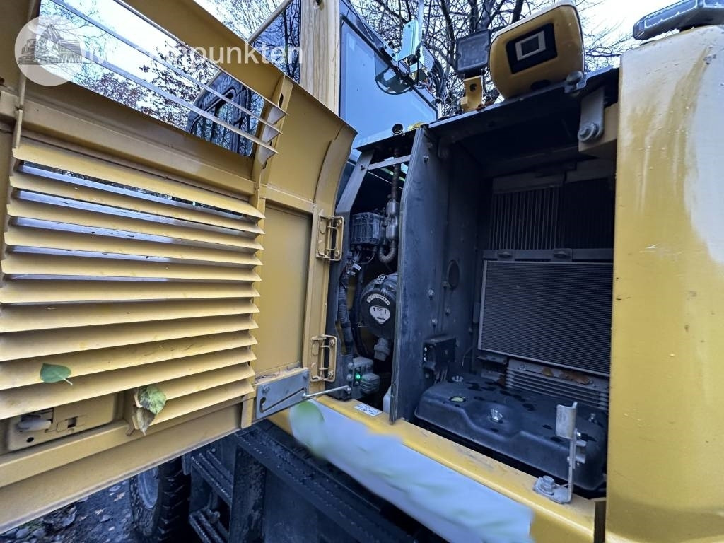 Pelle sur pneus Komatsu PW 148-11 med vagn och redskap: photos 41 Pelle sur pneus Komatsu PW 148-11 med vagn och redskap: photos 41