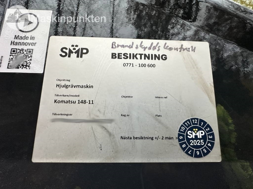 Pelle sur pneus Komatsu PW 148-11 med vagn och redskap: photos 12 Pelle sur pneus Komatsu PW 148-11 med vagn och redskap: photos 12