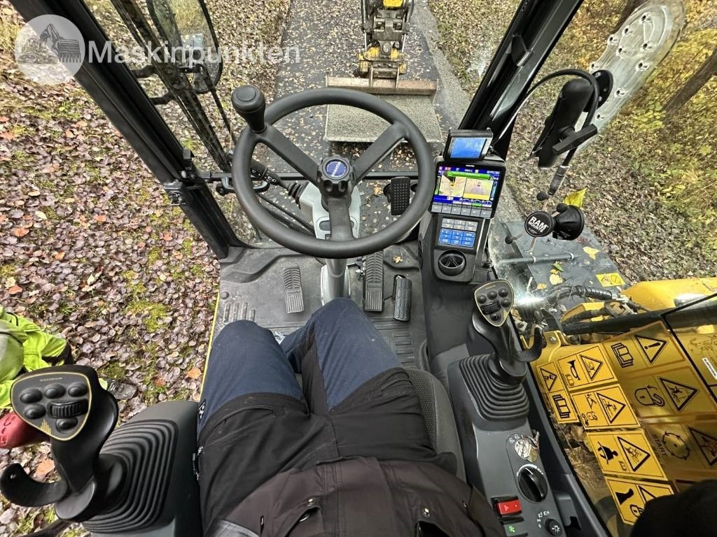 Pelle sur pneus Komatsu PW 148-11 med vagn och redskap: photos 17 Pelle sur pneus Komatsu PW 148-11 med vagn och redskap: photos 17