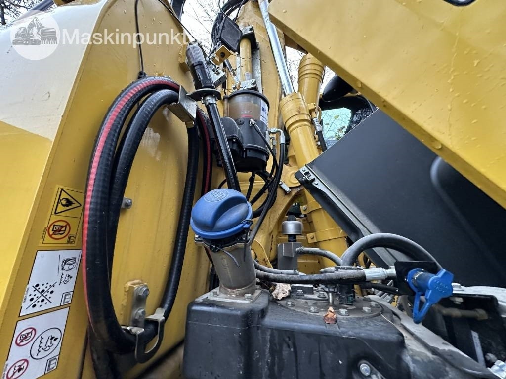 Pelle sur pneus Komatsu PW 148-11 med vagn och redskap: photos 49 Pelle sur pneus Komatsu PW 148-11 med vagn och redskap: photos 49