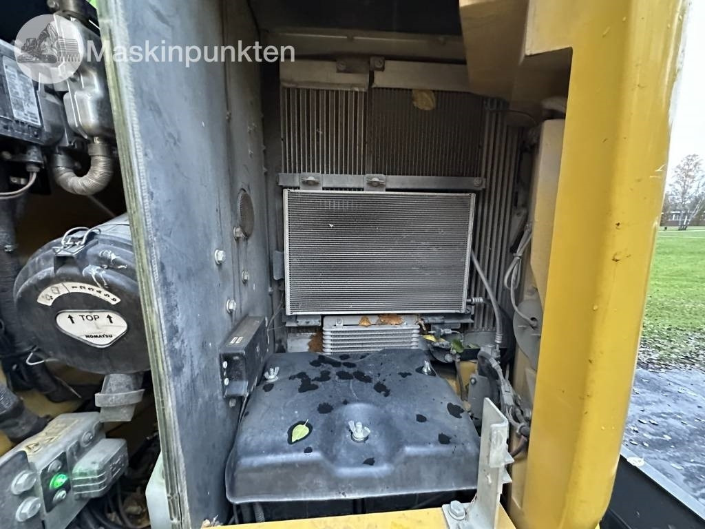 Pelle sur pneus Komatsu PW 148-11 med vagn och redskap: photos 42 Pelle sur pneus Komatsu PW 148-11 med vagn och redskap: photos 42