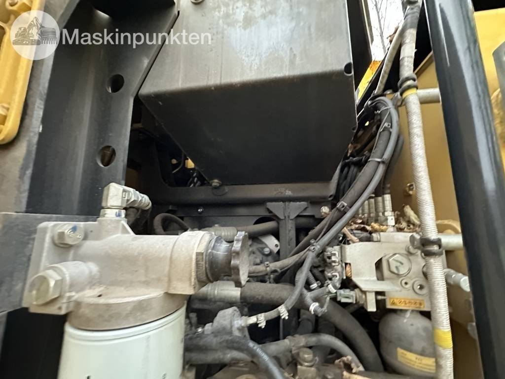 Pelle sur pneus Komatsu PW 148-11 med vagn och redskap: photos 47 Pelle sur pneus Komatsu PW 148-11 med vagn och redskap: photos 47