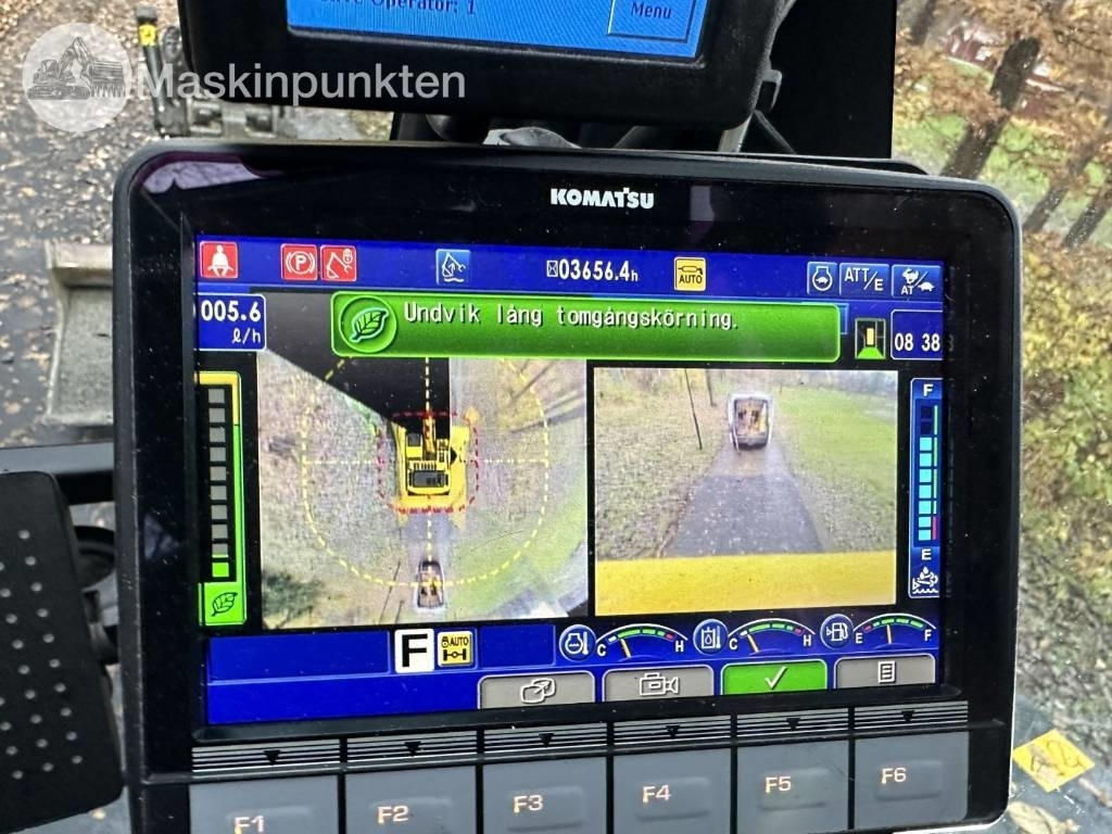 Pelle sur pneus Komatsu PW 148-11 med vagn och redskap: photos 24 Pelle sur pneus Komatsu PW 148-11 med vagn och redskap: photos 24