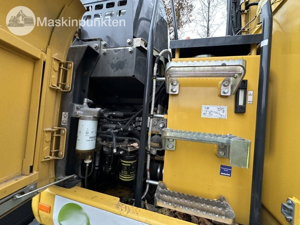 Pelle sur pneus Komatsu PW 148-11 med vagn och redskap: photos 45 Pelle sur pneus Komatsu PW 148-11 med vagn och redskap: photos 45